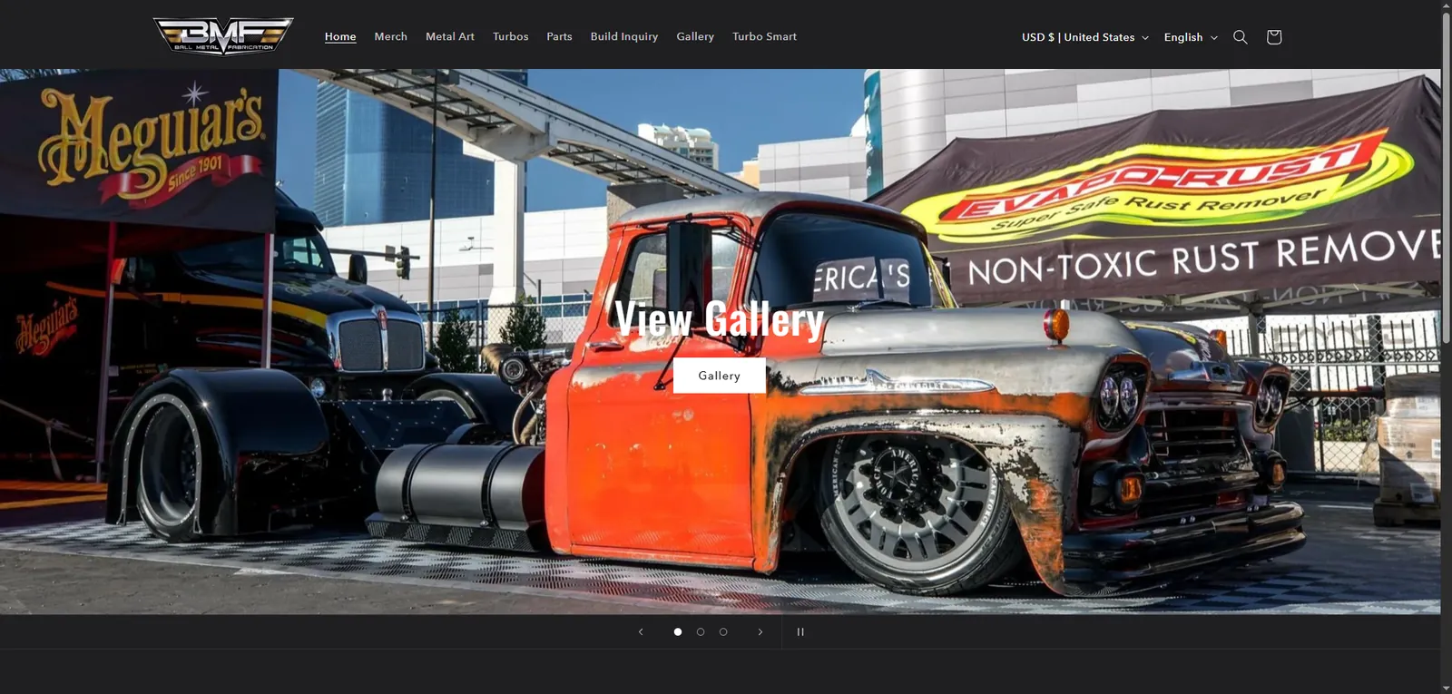 Ball Metal Fab website home page showing a custom rusted pickup truck at a car show